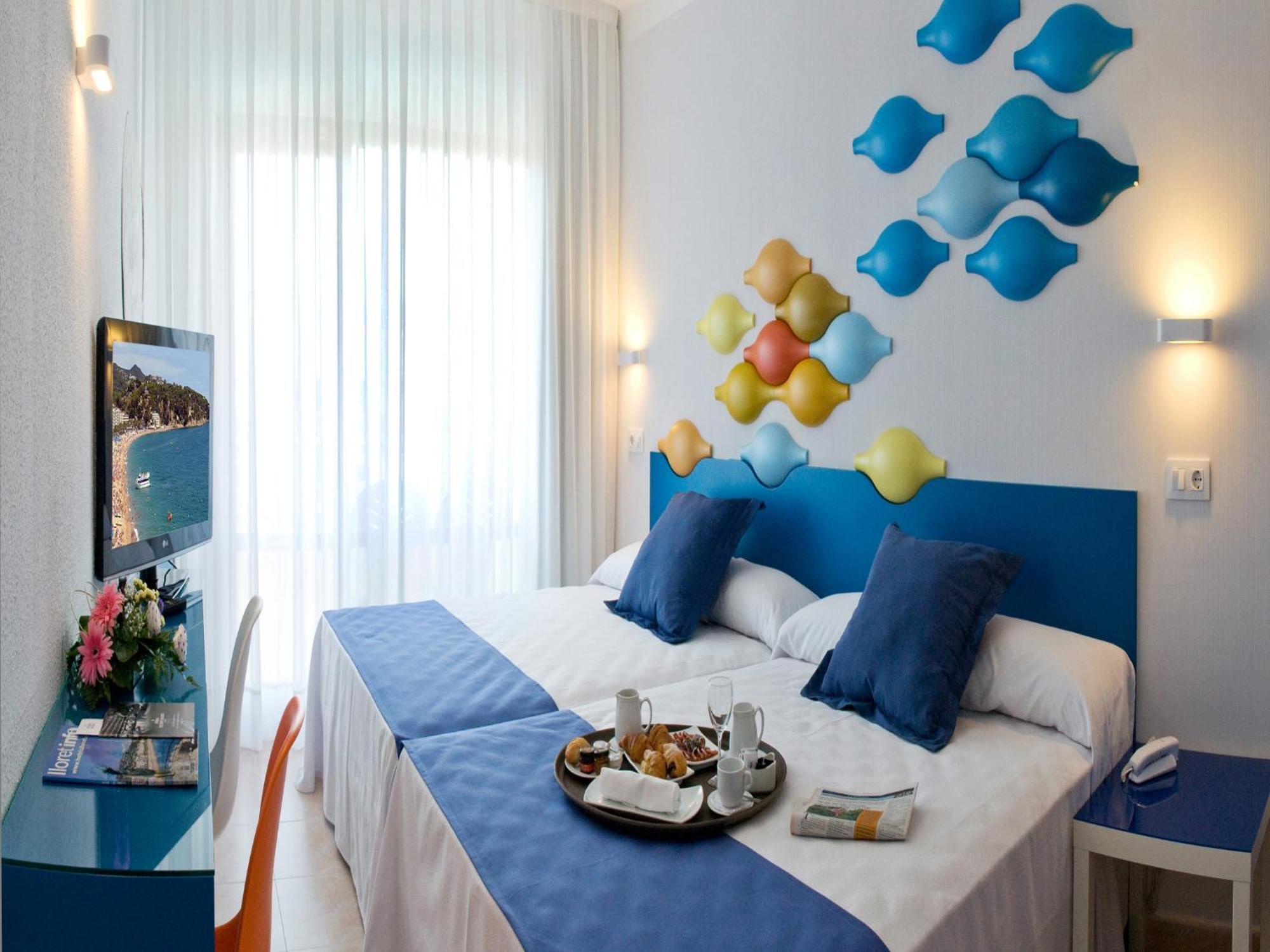 Doppel- oder Zweibettzimmer
